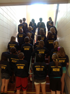 Members of Folly Quarter Middle Schools LEO club show off their "Make a Difference NOW" shirts. 